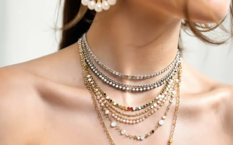"Modern jewelry showcasing 2025 trends with bold and colorful designs."